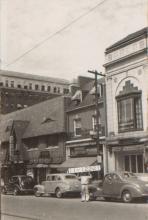 Street view of several storefronts, including that of the Century Room, visible at far left. Courtesy of Missouri Valley Special Collections, Kansas City Public Library.